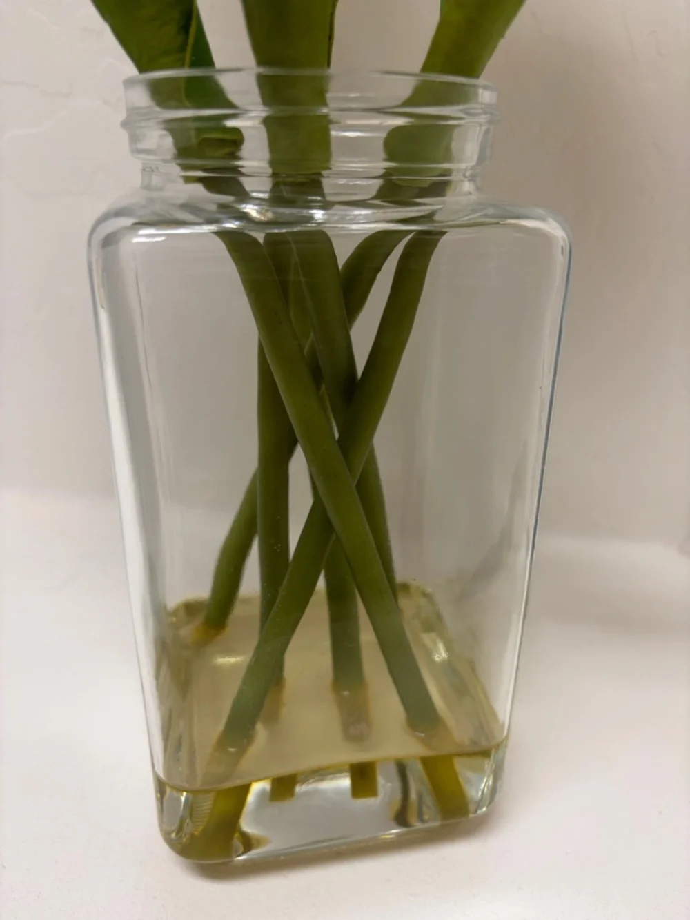 Bright Yellow Tulip Faux Floral Arrangement in Clear Glass Vase